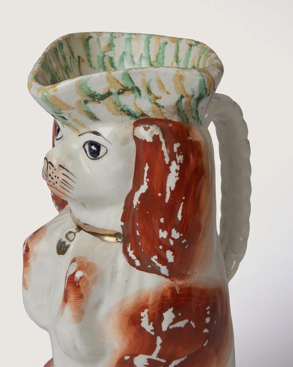 close-up detail of
hand-painted glaze and
authentic historic crazing on
staffordshire figurine