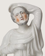 close-up detail of
hand-painted glaze
and authentic historic
crazing on
staffordshire figurine