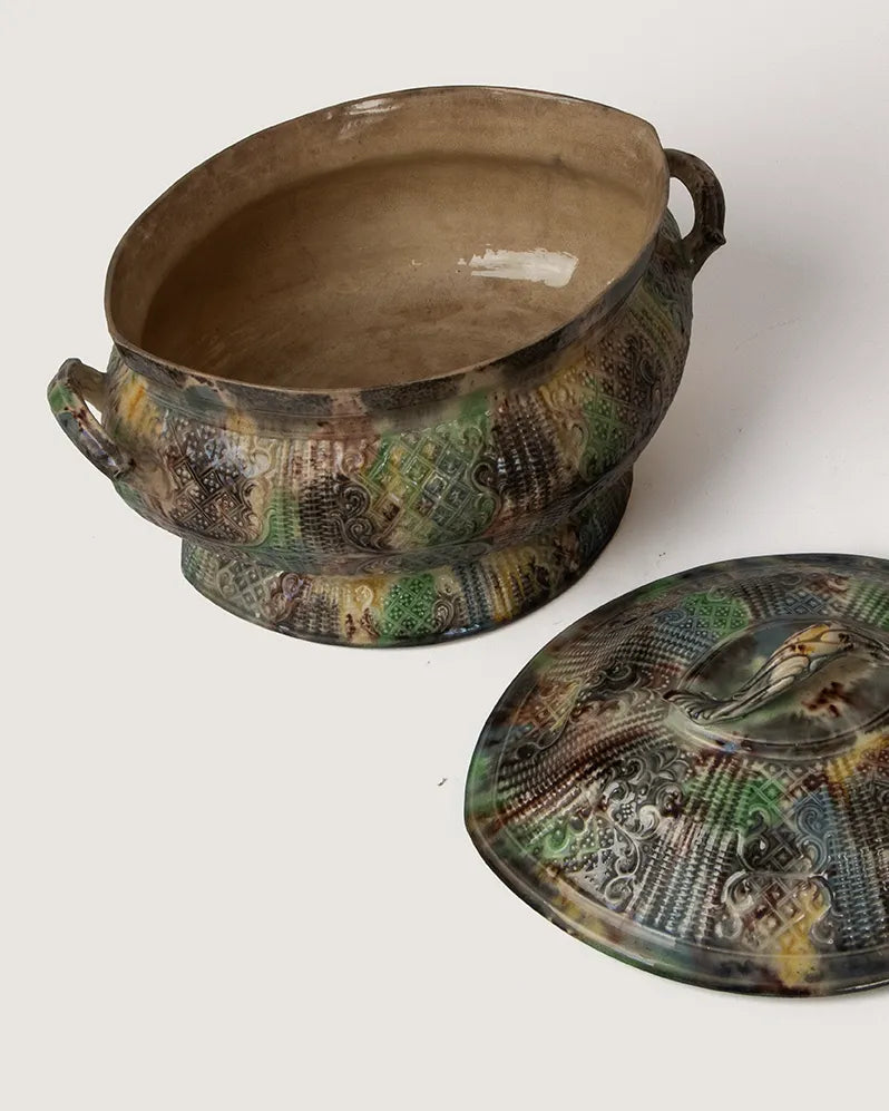 editorial view of 19th-century
majolica pottery styled in an
architectural digest aesthetic