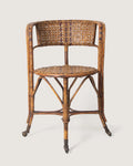 Early 20th-century antique Italian wicker and rattan armchair on castors, made by Dal Vera Milano.