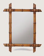 Full front view of the 44 x 56 cm antique French faux bamboo mirror, showcasing its rustic cane-cut corners and warm honey wood tone against a white background.