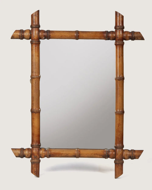 Full front view of the 44 x 56 cm antique French faux bamboo mirror, showcasing its rustic cane-cut corners and warm honey wood tone against a white background.