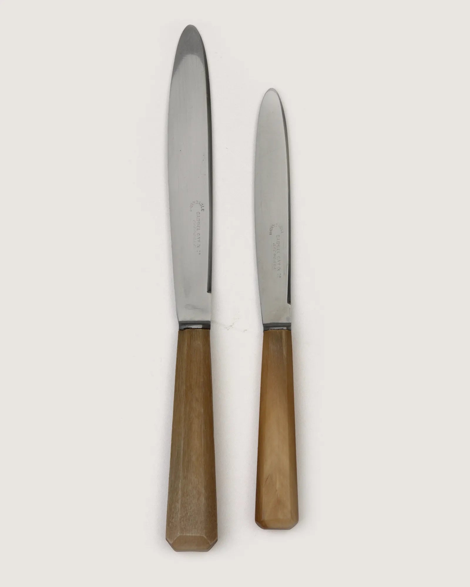 Early 20th-century antique French 16-piece flatware knife set with dark horn handles by Gabriel Gay & Co.