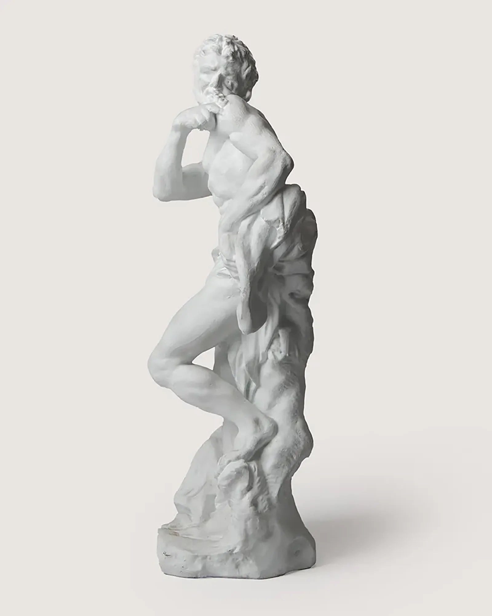 Early 20th-century antique French academic plaster sculpture depicting a classical male figure.