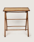 Early 20th-century antique French wooden side table with finely carved faux bamboo legs and trim.