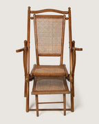 Early 20th-century antique French folding steamer deck chair made of original wood and woven cane work.