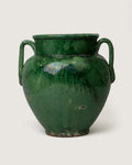 Vintage early 20th-century French terracotta confit pot coated in a vibrant, glossy green glaze.