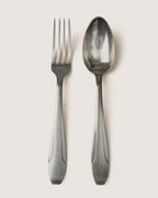 Early 20th-century antique French silver-plated cutlery service for 8, elegant vintage tableware.