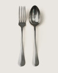 Early 20th-century antique French silver-plated flatware table service for 8 in the classic ornate Spatule design.