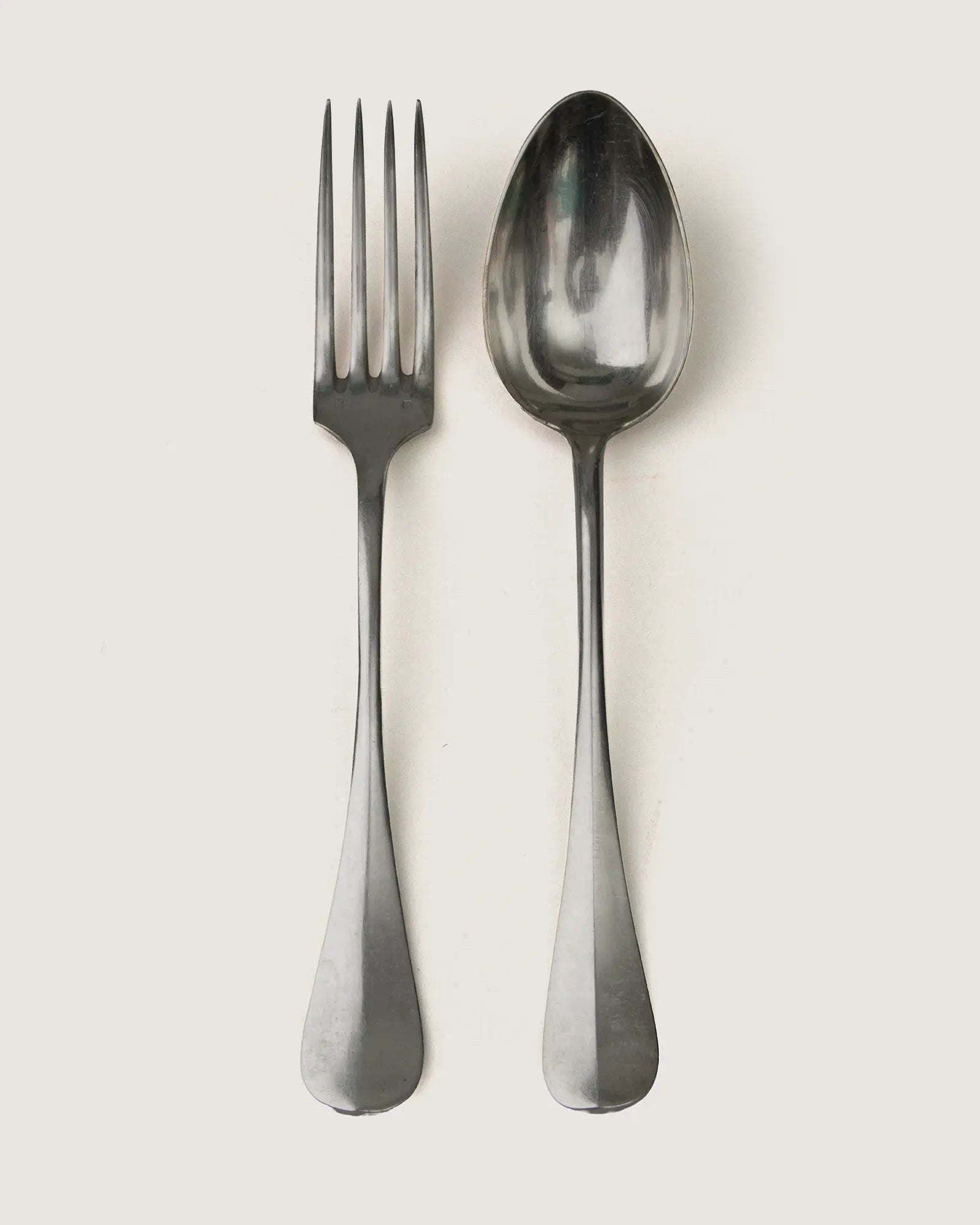 Early 20th-century antique French silver-plated flatware table service for 8 in the classic ornate Spatule design.