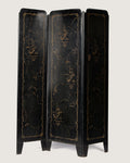 Full front view of the antique Italian lacquered metal radiator screen fully standing, highlighting the three folding panels decorated with gold orientalist graphics.