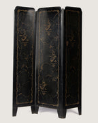 Full front view of the antique Italian lacquered metal radiator screen fully standing, highlighting the three folding panels decorated with gold orientalist graphics.