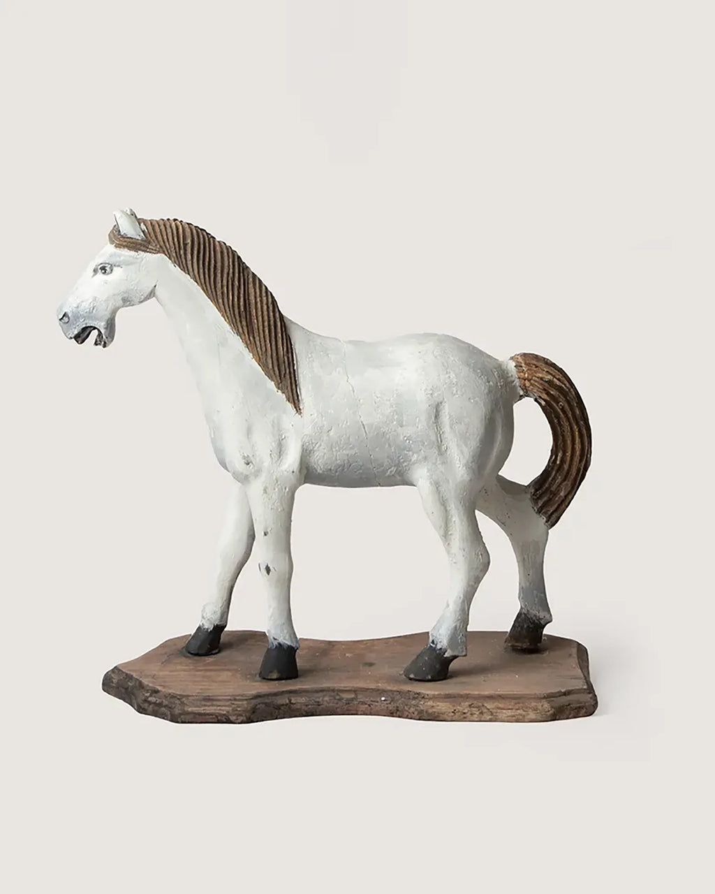 Early 20th-century antique Italian toy horse, beautifully hand-carved from wood with a rich weathered patina.