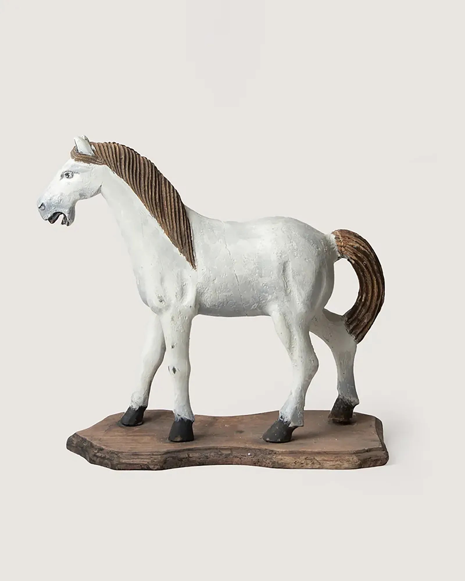 Early 20th-century antique Italian toy horse, beautifully hand-carved from wood with a rich weathered patina.