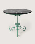 Antique early 20th-century Italian garden table with a green wrought iron frame and a hand-painted trompe-l'œil faux marble top. One-of-a-kind vintage garden decor curated by Atelier Bellinzona.