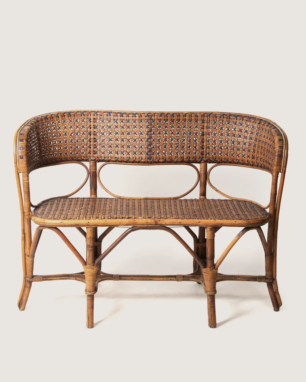 Early 20th-century antique Italian two-seater bench or settee crafted from woven wicker and sturdy natural bamboo.