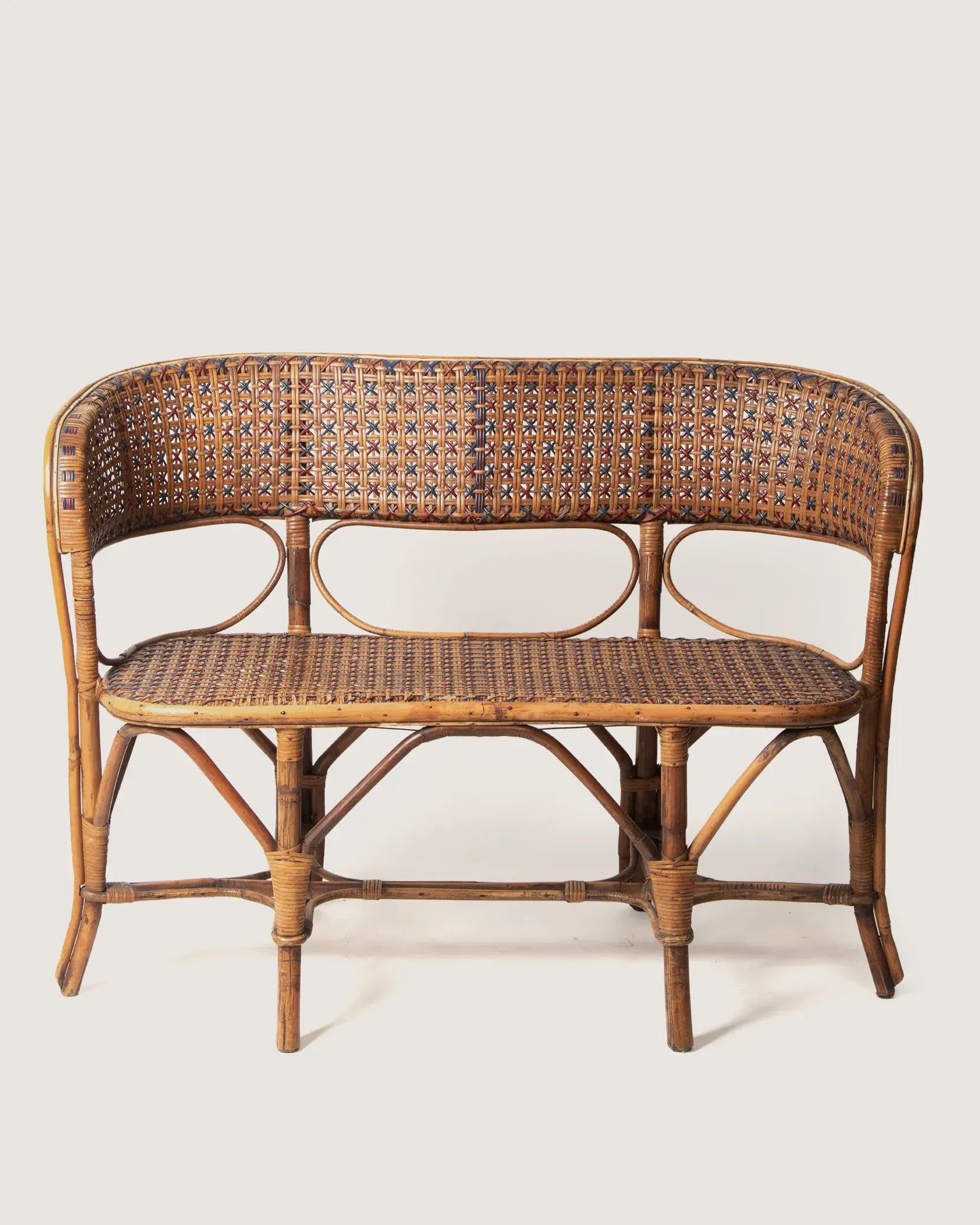 Early 20th-century antique Italian two-seater bench or settee crafted from woven wicker and sturdy natural bamboo.