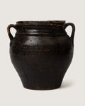 Unique early 20th-century Piedmontese terracotta confit pot with a rare, characterful lopsided handmade silhouette.