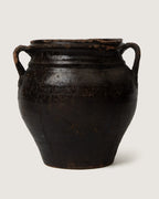 Unique early 20th-century Piedmontese terracotta confit pot with a rare, characterful lopsided handmade silhouette.