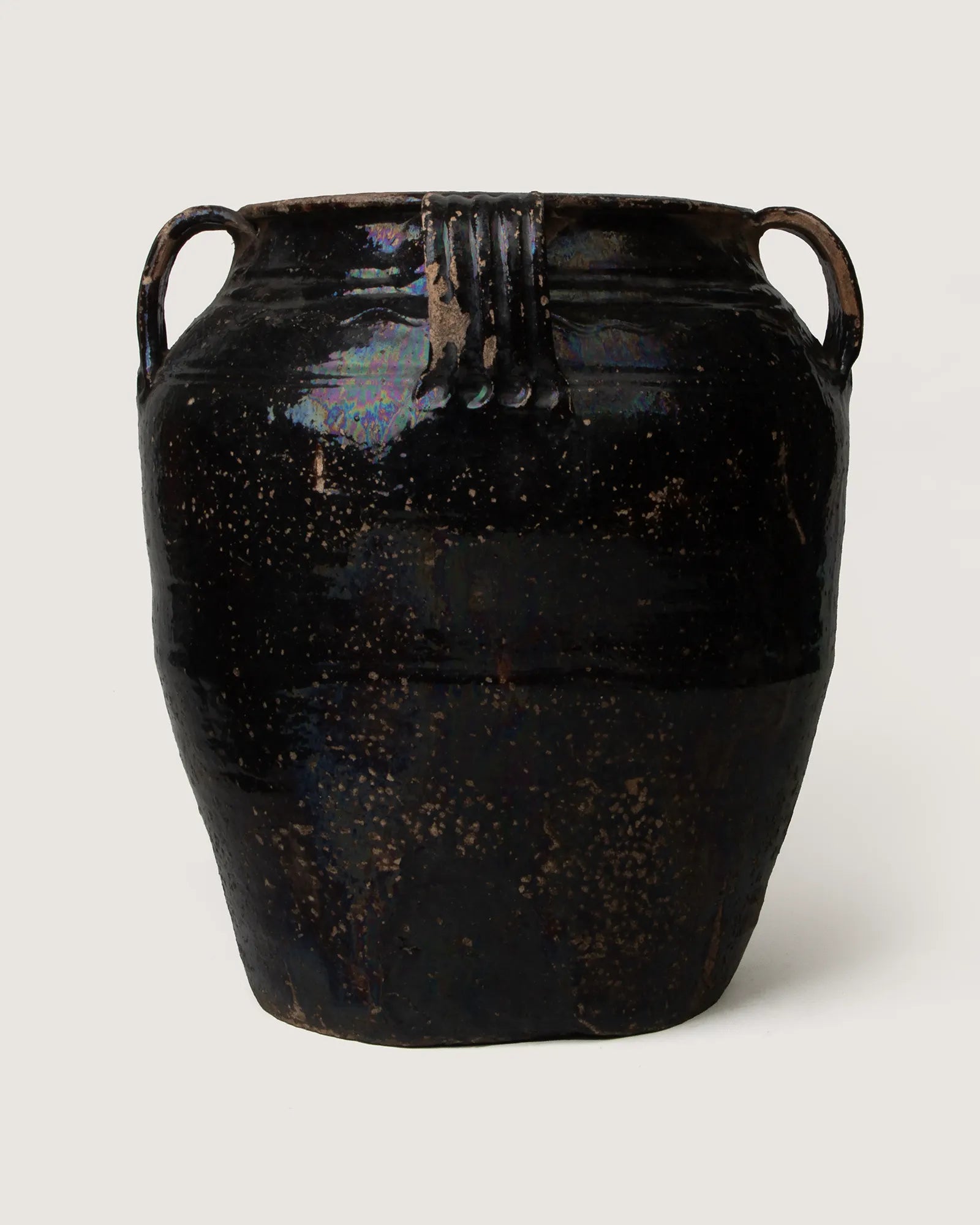 Mid-20th-century medium Northern Italian confit pot from Piedmont, showcasing a warm honey-colored iridescent glaze.