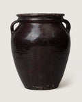 Authentic early 20th-century Piedmontese terracotta pot featuring a heavily weathered and worn painted surface.
