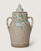 Rare early 20th-century terracotta storage jar with its original lid from Central Italy, finished in a rustic splatterware glaze.