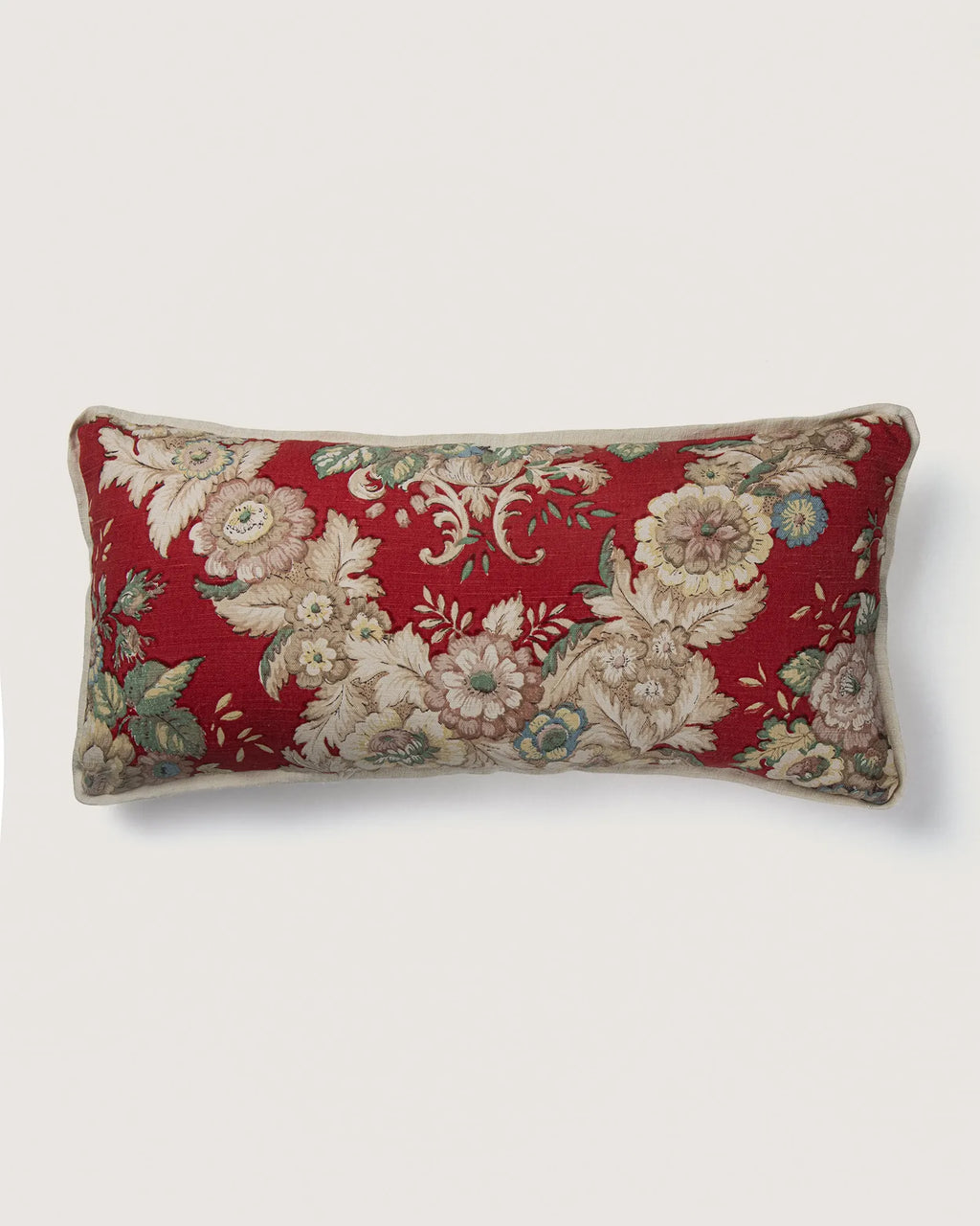 Full front view of a rectangular 56x26 cm lumbar cushion showcasing a symmetrical neoclassical floral bouquet pattern on a vibrant red background.