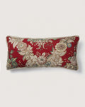 Full front view of a rectangular 56x26 cm lumbar cushion showcasing a symmetrical neoclassical floral bouquet pattern on a vibrant red background.