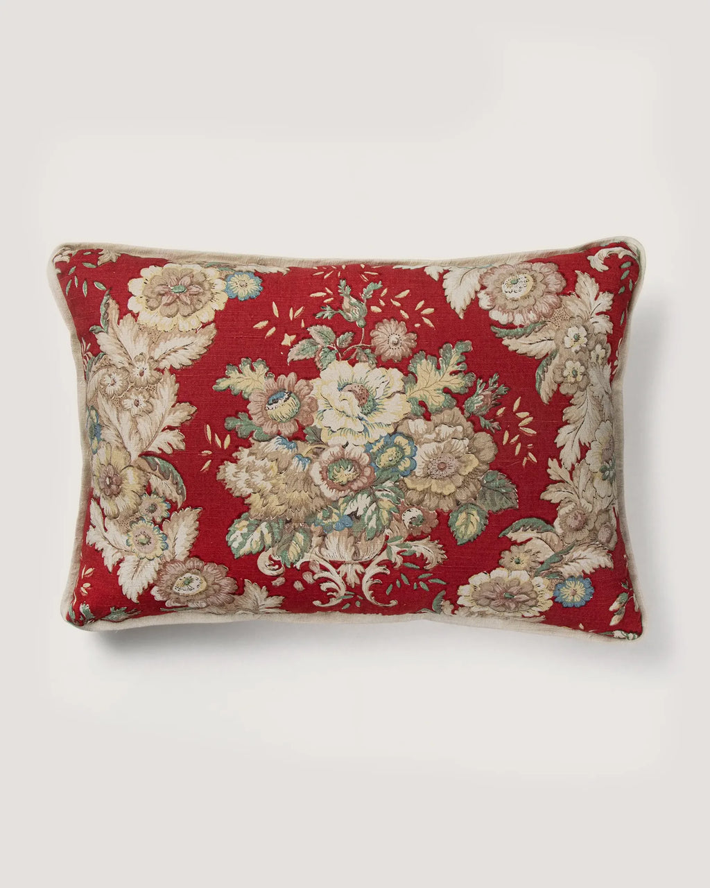Full front view of a rectangular 56x26 cm lumbar cushion showcasing a symmetrical neoclassical floral bouquet pattern on a vibrant red background.