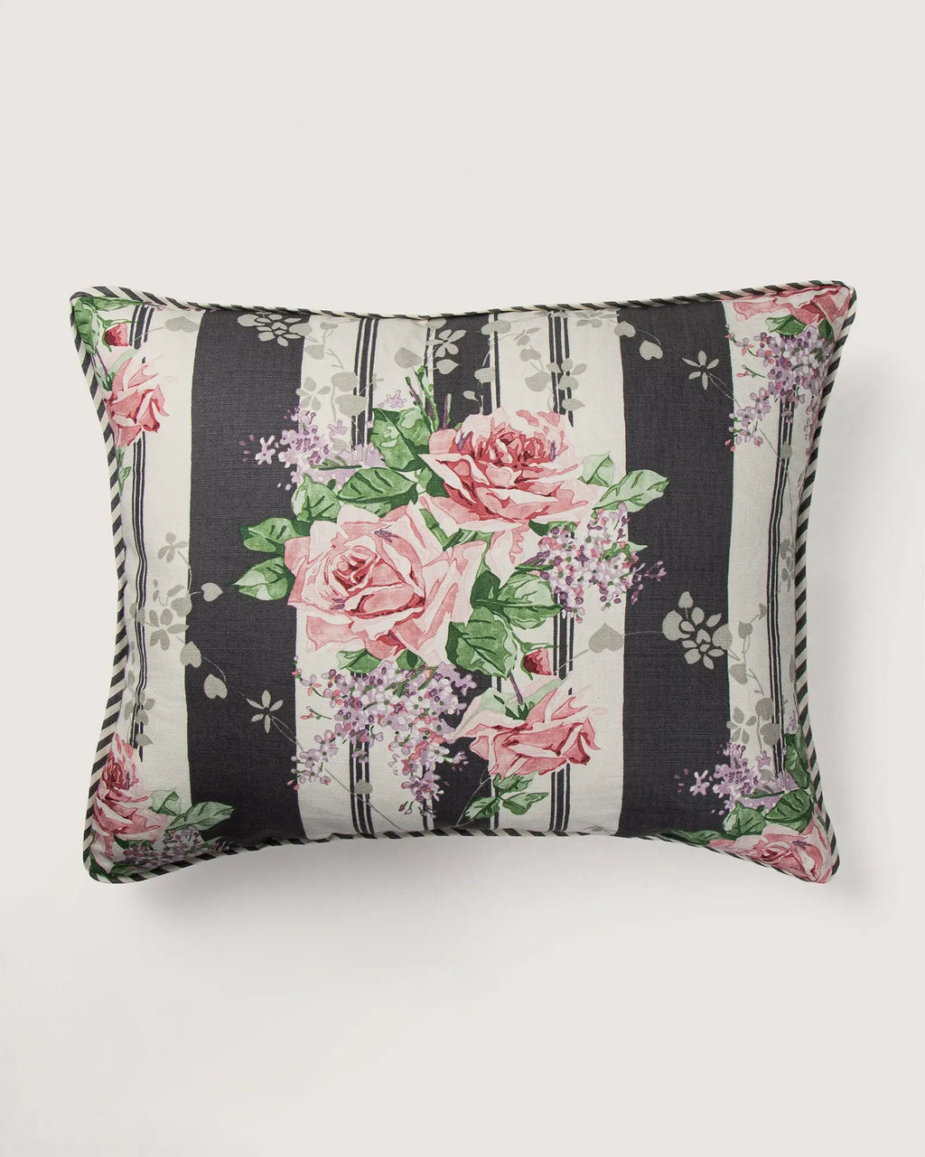Full front view of a 52x42 cm rectangular cushion in vintage Sanderson cotton, showcasing large pink roses and purple lilacs printed over wide black and white vertical bands.