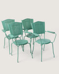 Set of four 1950s mid-century modern Italian outdoor armchairs in mint green tubular metal with a retro patio silhouette. One-of-a-kind vintage seating curated by Atelier Bellinzona.