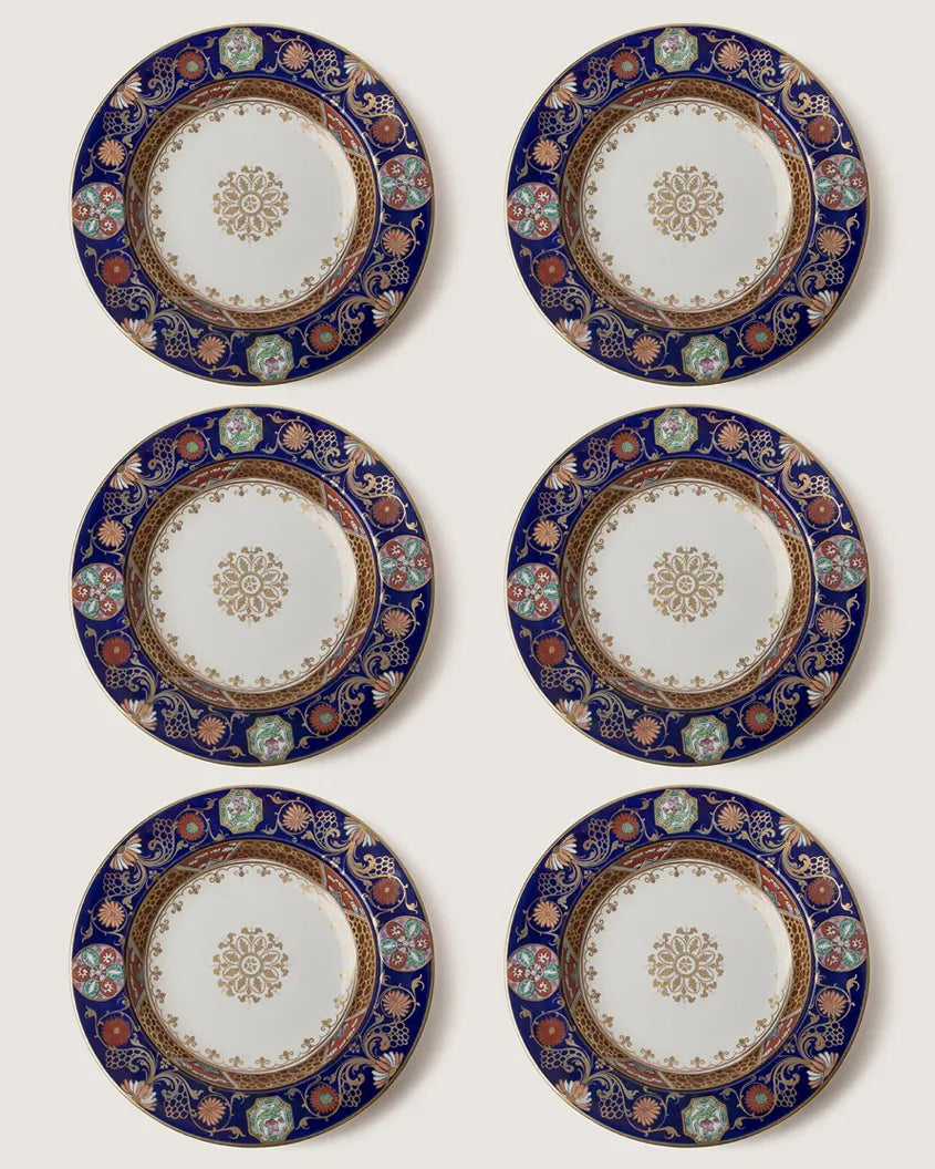 Full top-down view of 6 antique English Imari pattern deep plate, showcasing the rich cobalt blue border, gold floral scrolls, and central gold rosette.