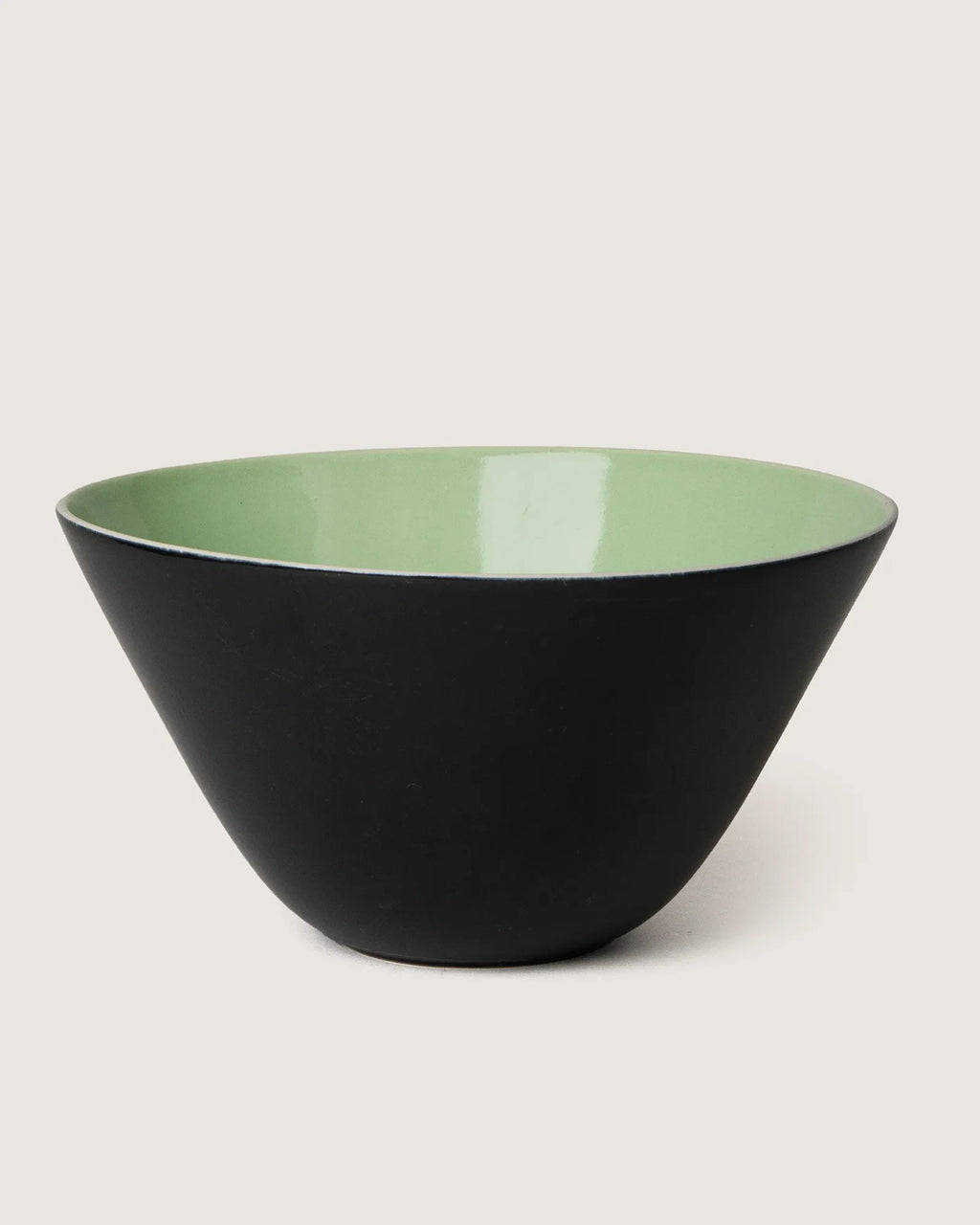Sleek 1950s mid-century modern Italian ceramic bowl in a striking graphic black and mint green colorway.