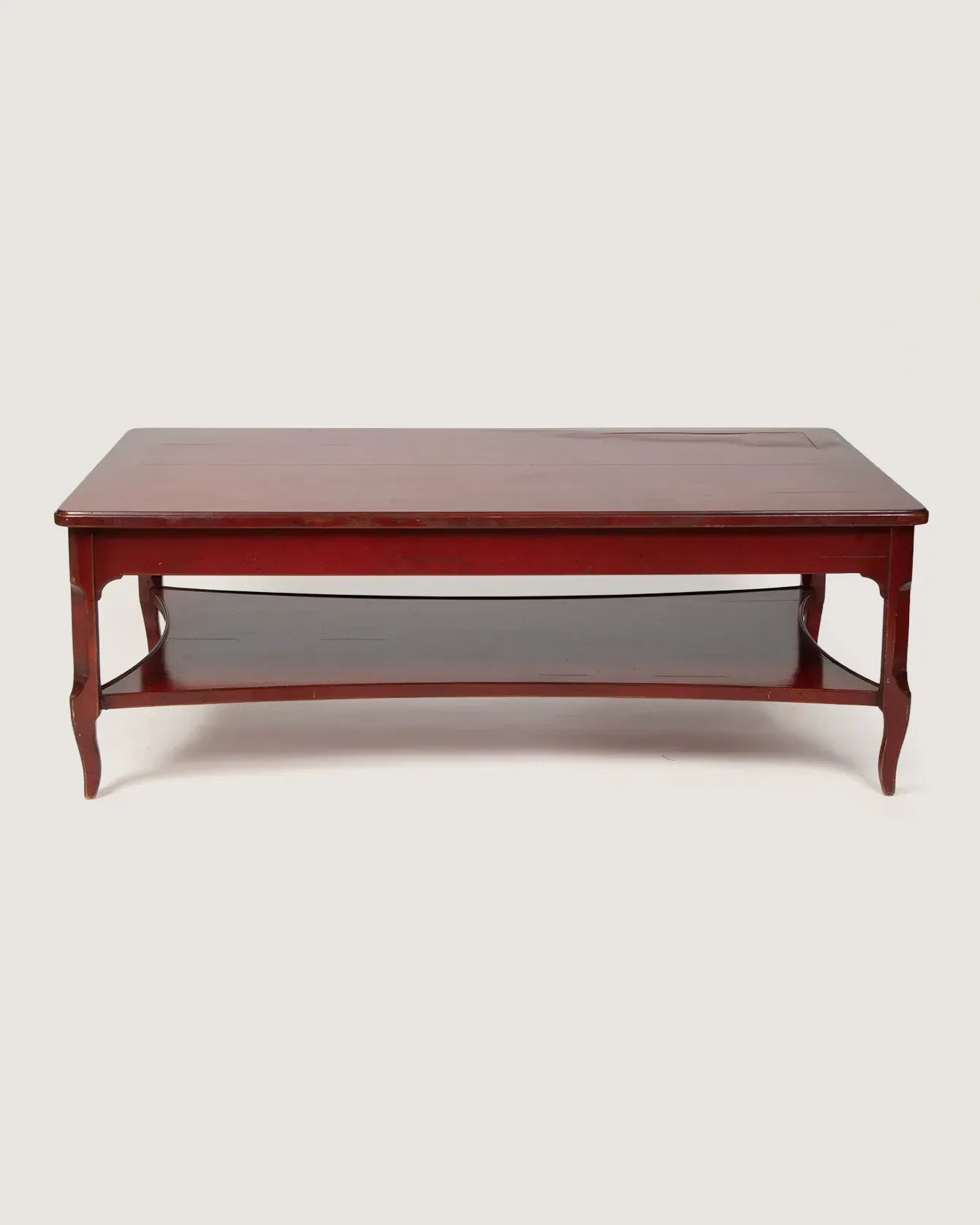 Vintage 1960s mid-century modern coffee table with an Oriental silhouette in a bold, glossy red lacquered finish.