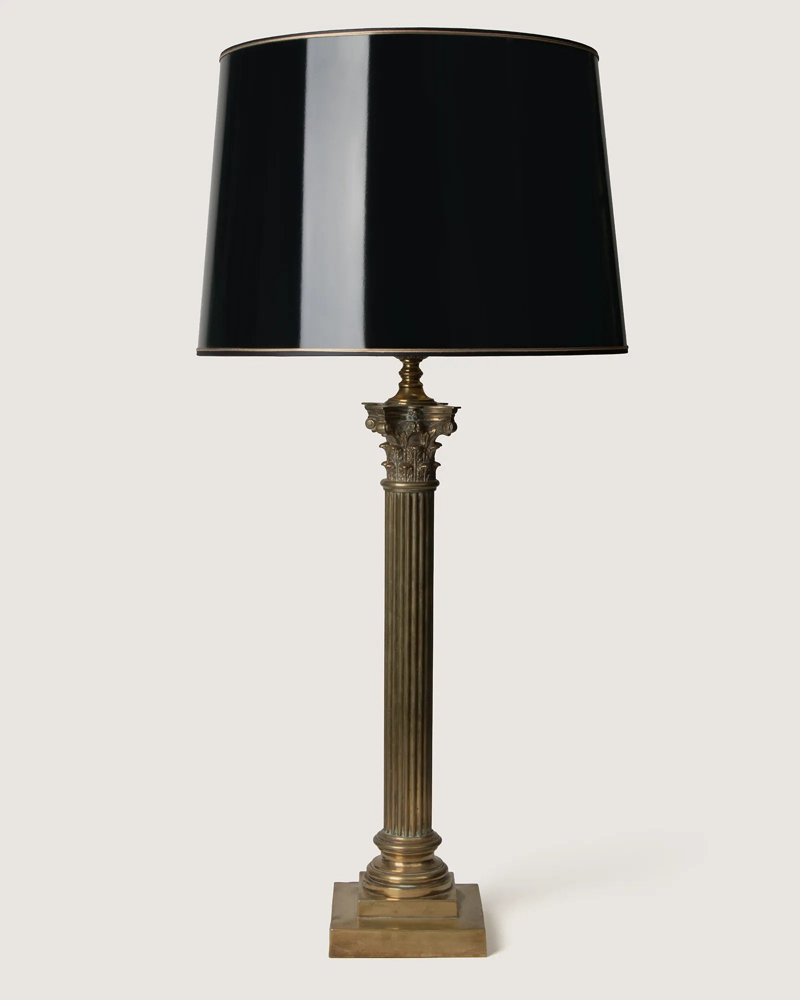 Monumental 1950s or 1960s brass column table lamp in the Neoclassical Revival style, a grand statement piece.