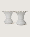 Stunning pair of late 19th-century French white opaline glass vases adorned with delicate gilded gold stars.