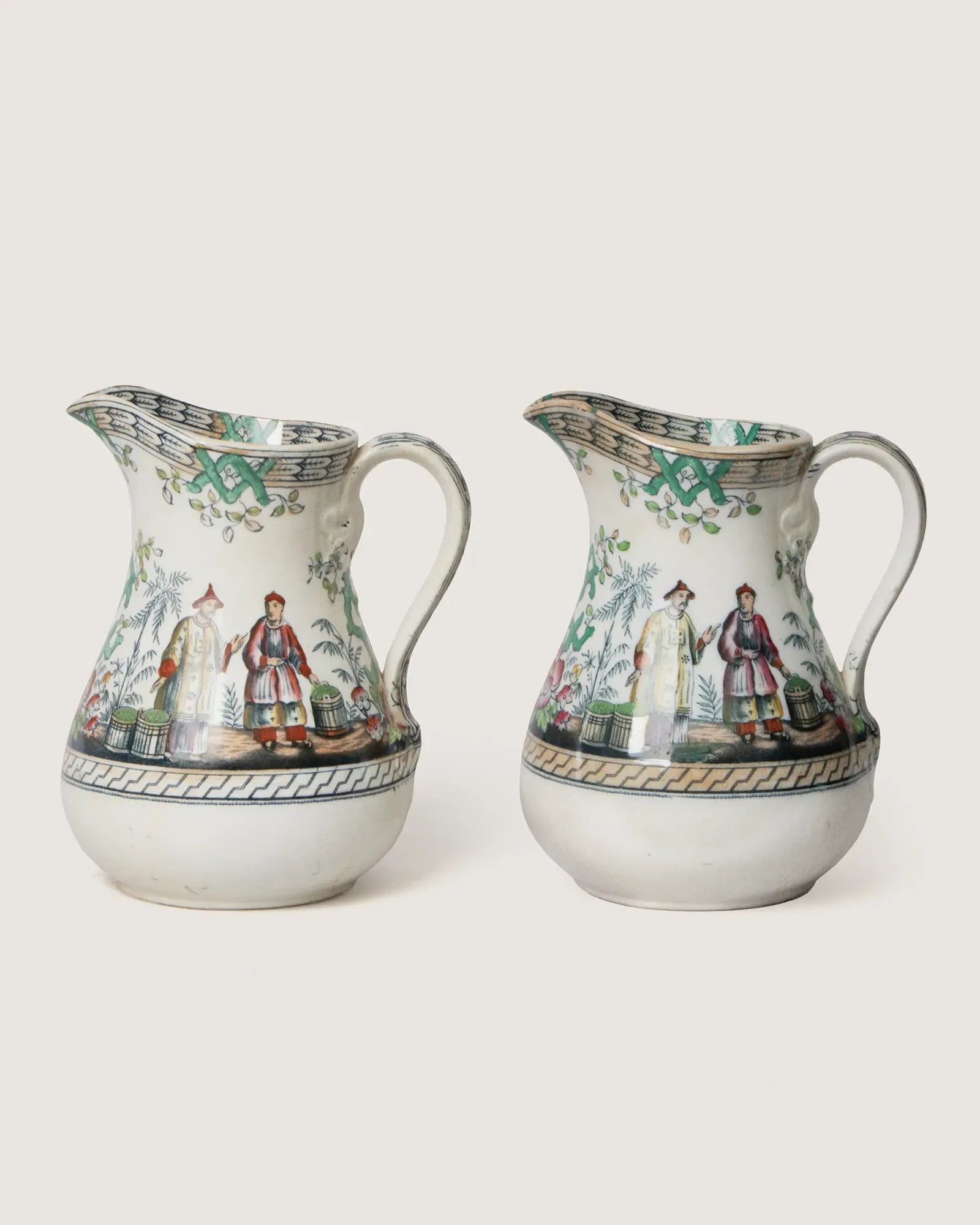 Rare mid-19th century pair of English Staffordshire jugs in the exotic Pekin transferware pattern by Beech & Hancock.