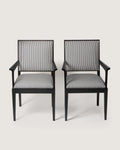 Pair of 1930s Art Deco black lacquered armchairs, bespoke reupholstered in a graphic black and white striped textile.