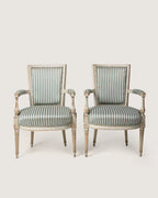 Late 19th-century pair of French Louis XVI style armchairs upholstered in rare vintage 1950s textiles.