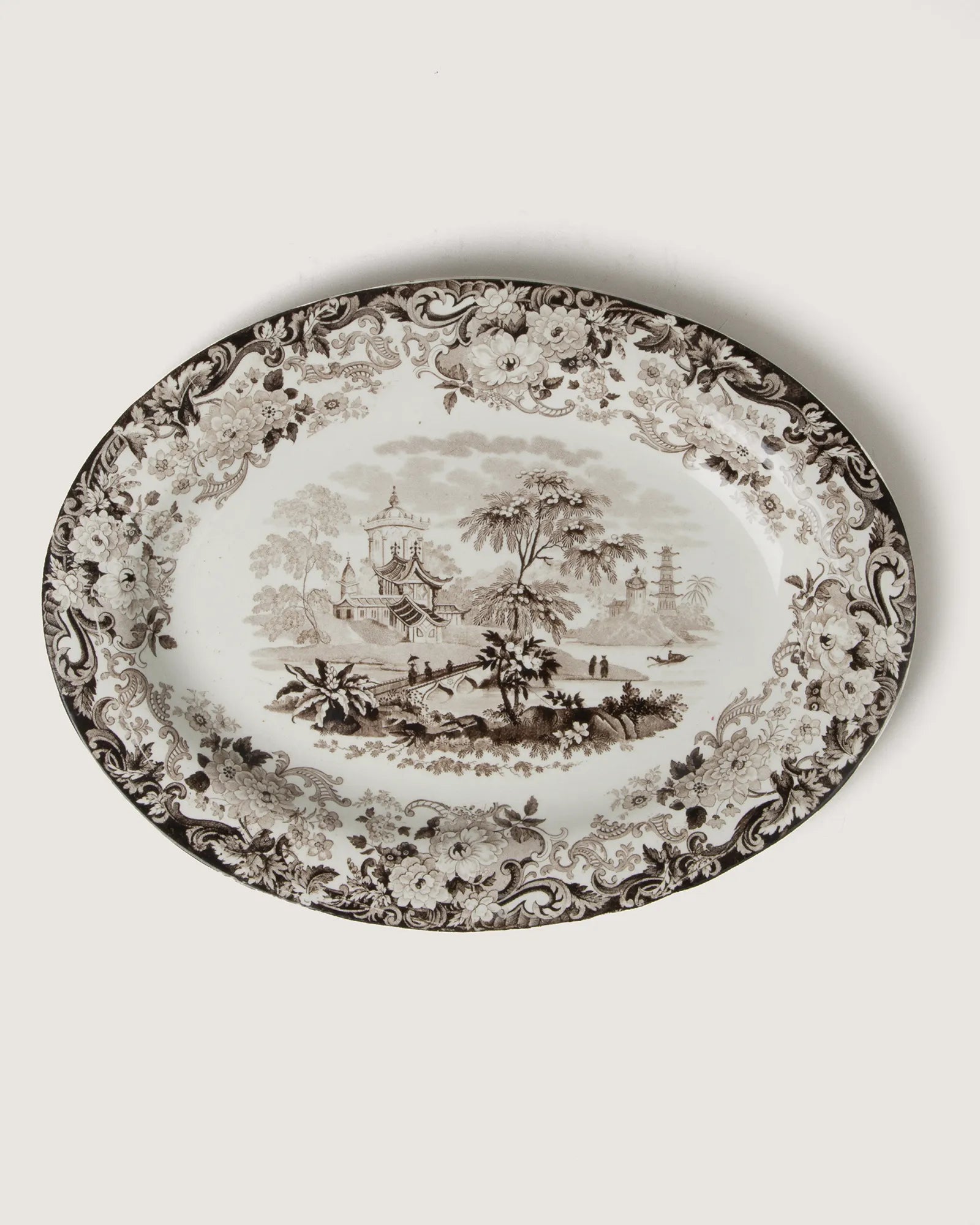 Beautiful pair of medium late 19th-century antique English Wedgwood serving platters featuring exquisite brown transferware patterns.