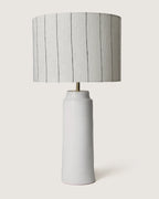 Pair of elegant white glazed Apulian ceramic table lamps complete with bespoke minimalist pinstripe fabric shades.