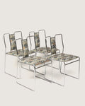 Set of four 1970s mid-century modern chromed tubular steel dining chairs upholstered in a rich patterned Oriental fabric.