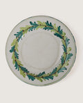 Set of six vintage Italian majolica ceramic plates hand-painted with green floral motifs, crafted in Bassano del Grappa, mid-20th century.