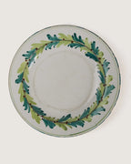Set of six vintage Italian majolica ceramic plates hand-painted with green floral motifs, crafted in Bassano del Grappa, mid-20th century.