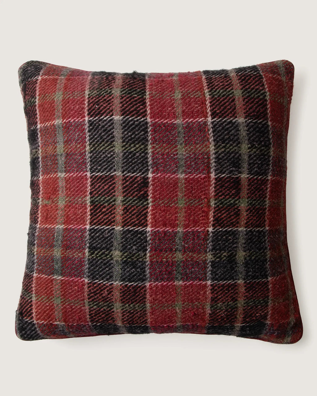 Reversible throw cushion crafted from vintage Eastern European plaid cotton and a coarse antique French grain sack hemp hemp fabric.